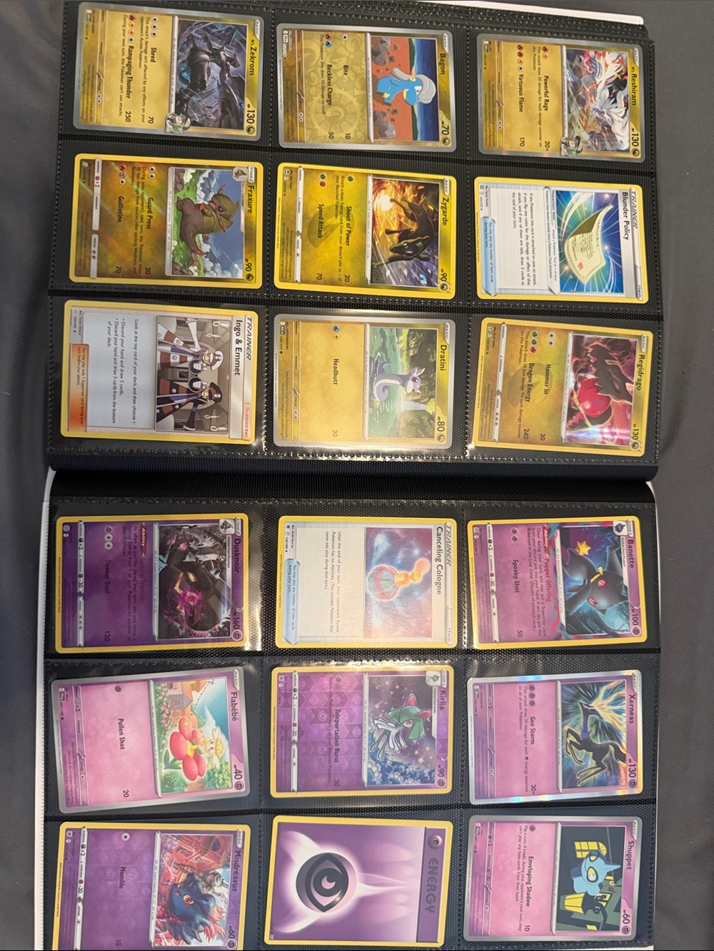 Pokemon Card Binder with Blue, Yellow, Pink and Black Accents